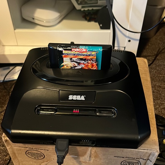 Sega génesis fully functional with all wires and 2 controllers and 2 games. - Picture 1 of 7